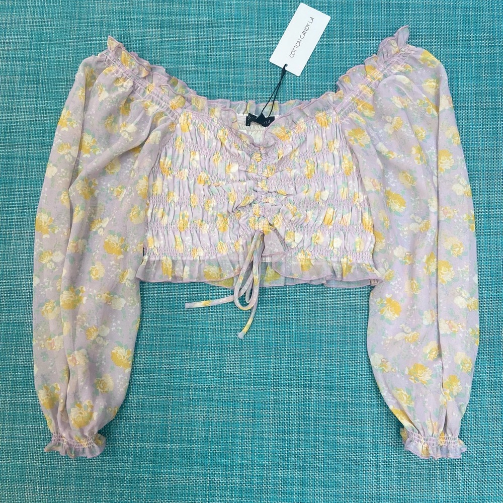 purple and yellow long sleeve top